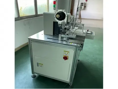 KV-230  Ojaladora automática para etiquetas colgantes