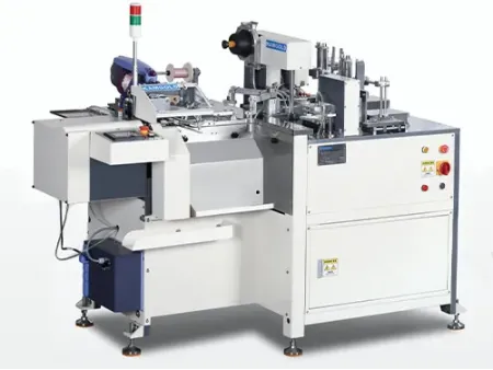 AS-570  Ojaladora automática y ensartadora de etiquetas colgantes